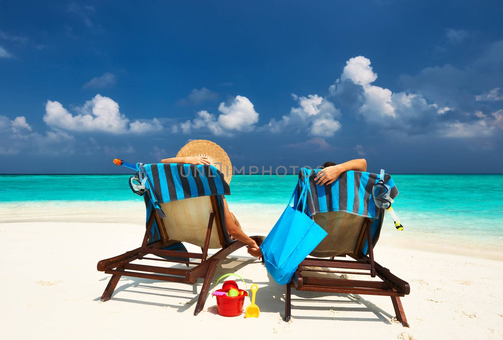 Couple on a tropical beach at Maldives