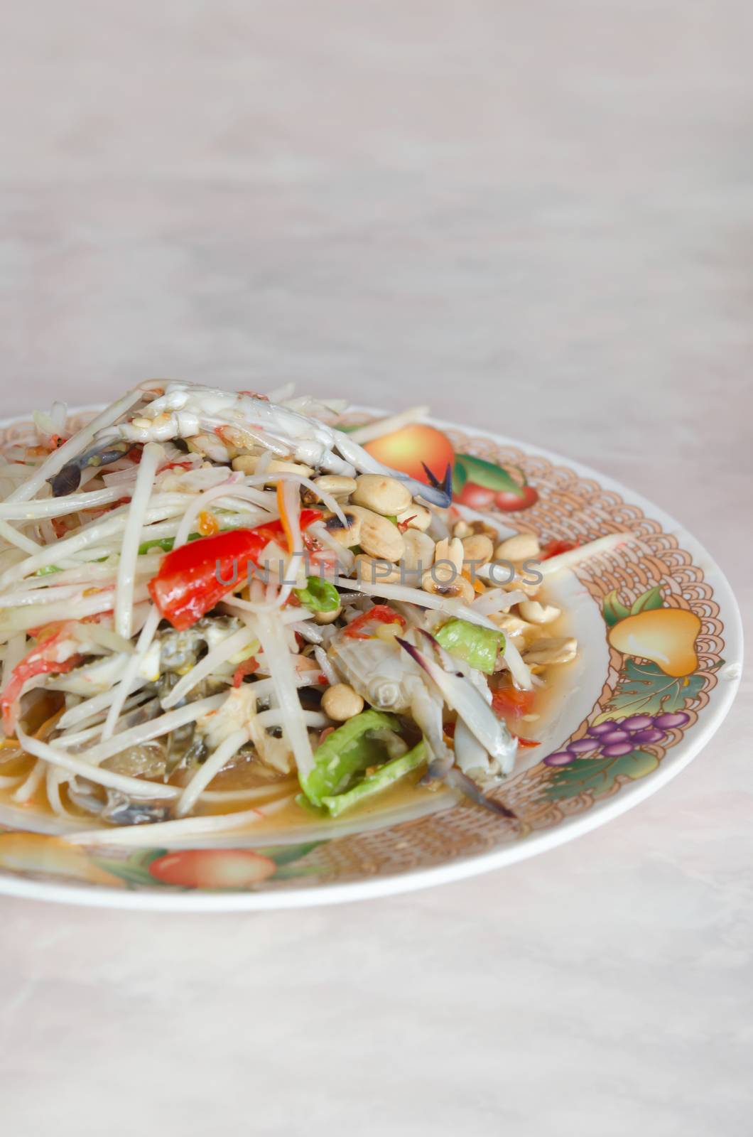 Spicy papaya salad with crab , asian spicy cuisine , sour and spicy