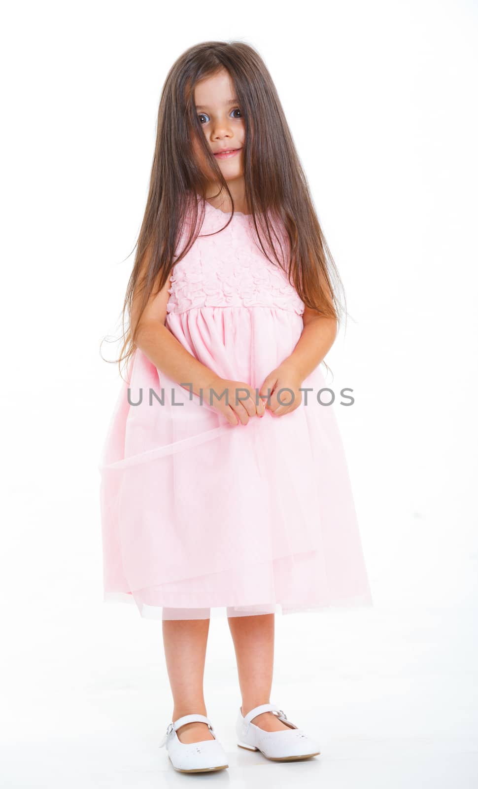 Beautiful little girl happy smiling on studio. Isolated white background