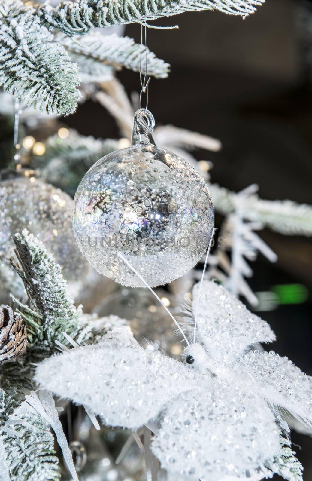 White ball decoration on the Christmas tree