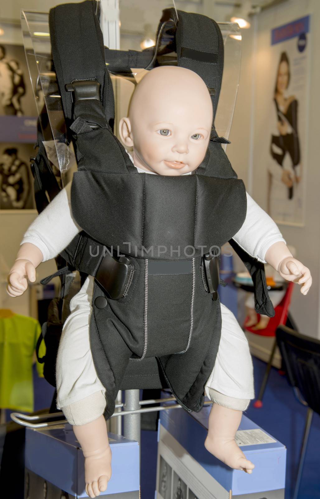 New model of baby carrier in the shop of accessories for children