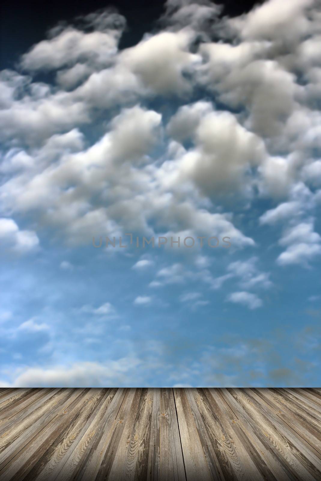 abstract view to the cloudy sky from old wooden floor 