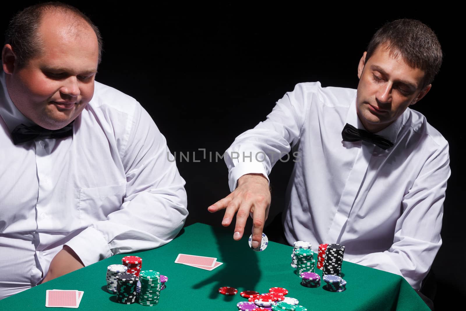 Two gentlemen in white shirts, playing cards by Discovod