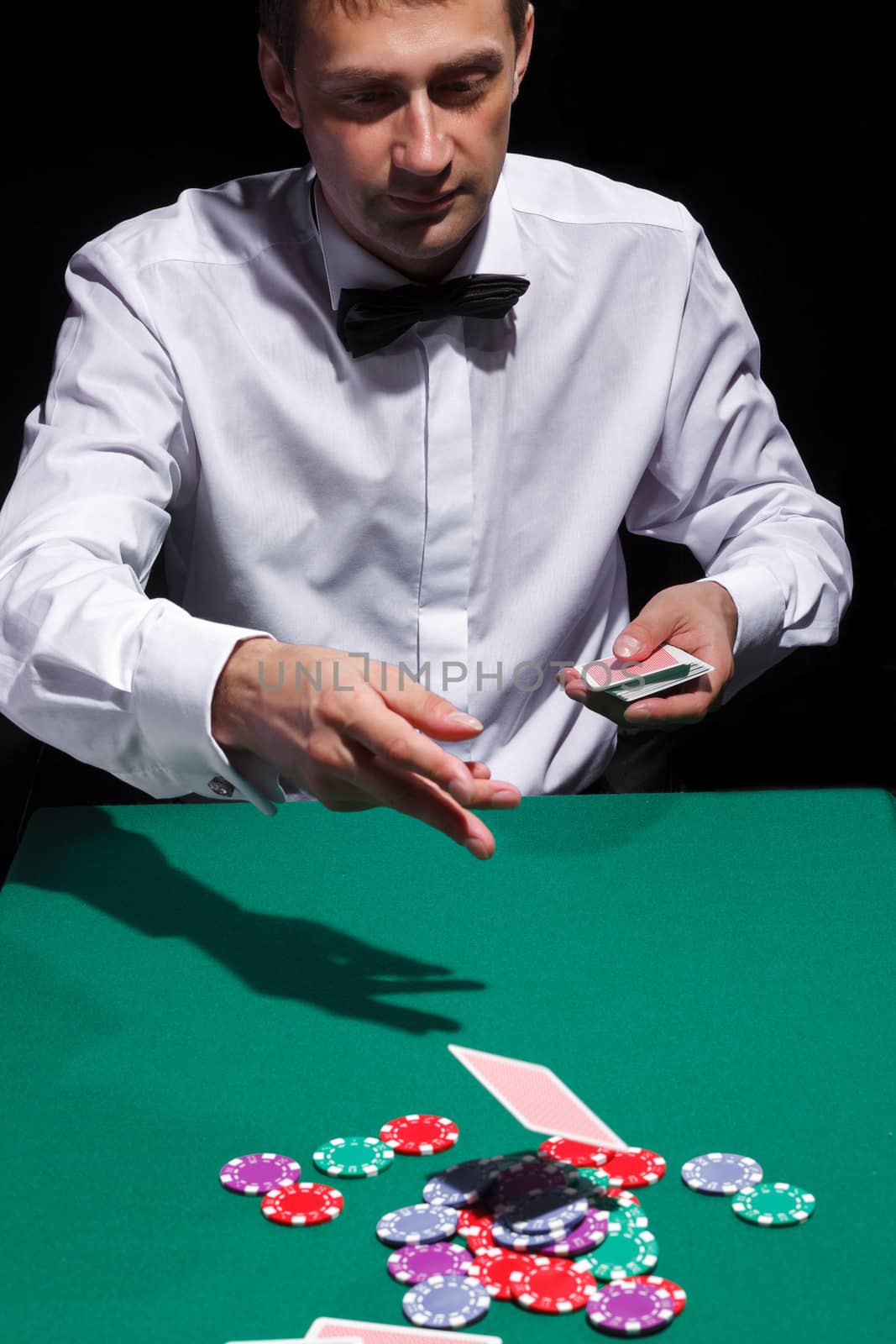Gentleman in white shirt, playing cards by Discovod