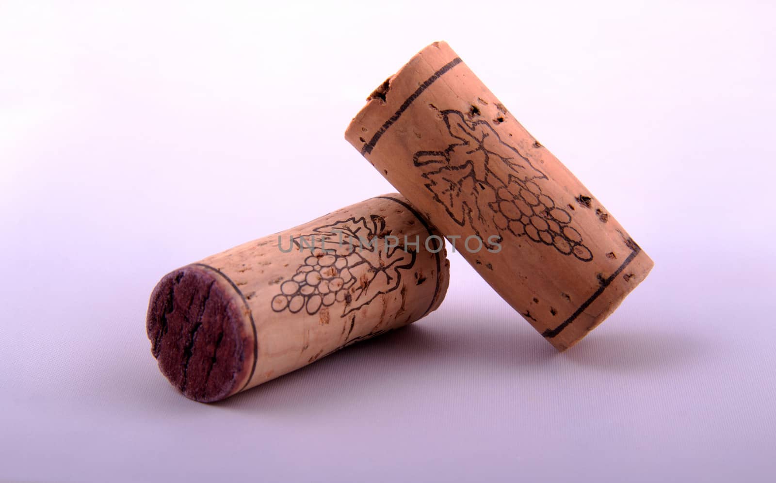 Two corks isolated in a white background