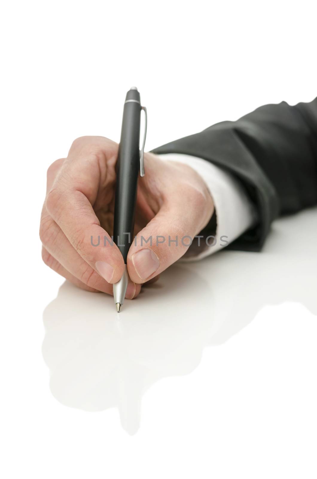 Detail of business man hand holding a pen. Isolated over white background with reflection.