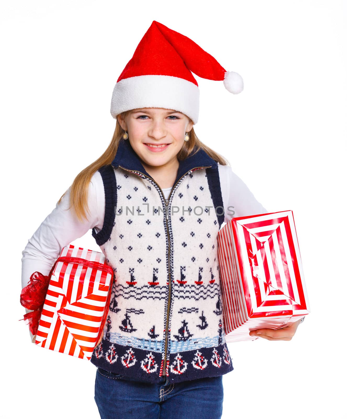 Christmas theme - Smiling cute girl in Santa's hat with gift box, isolated on white