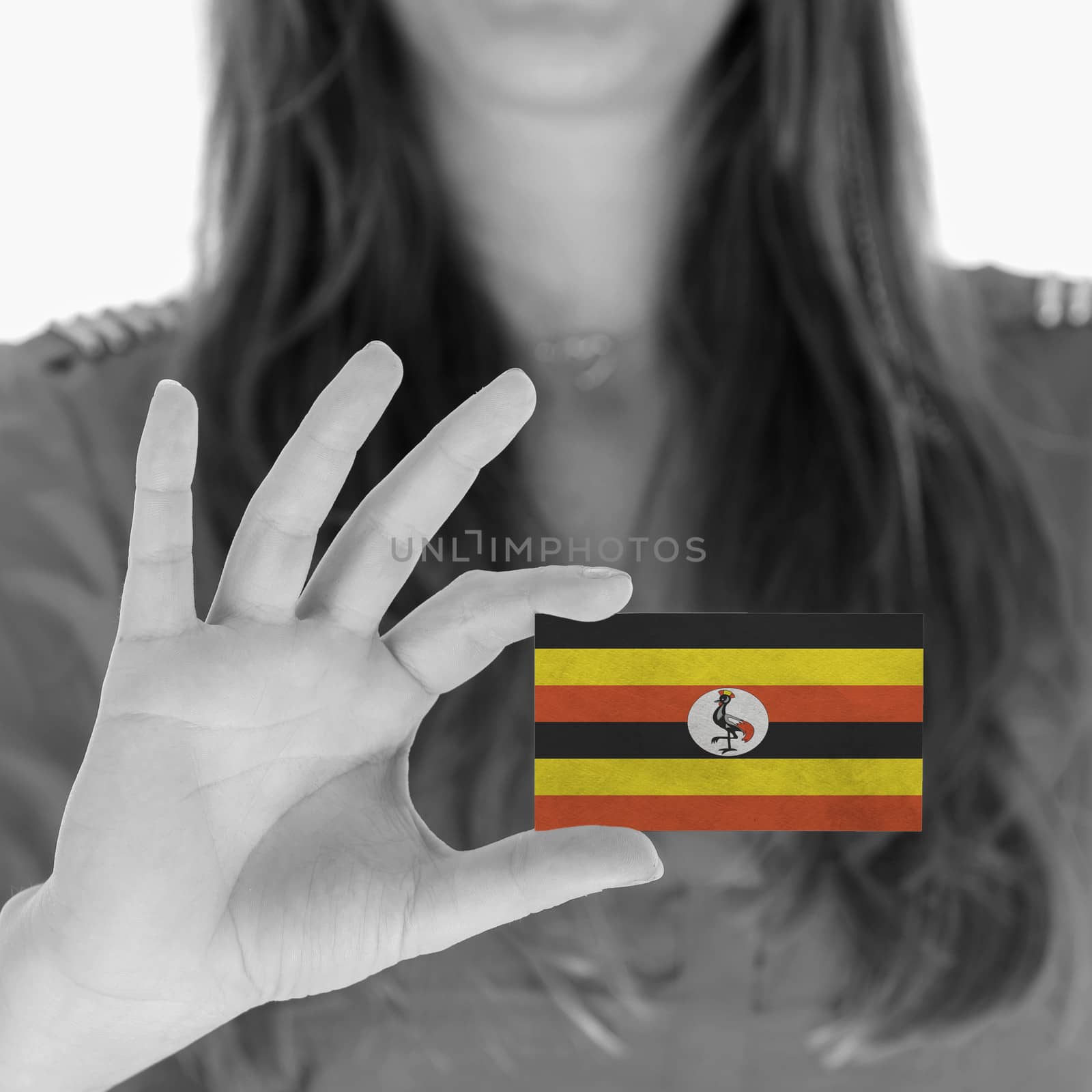 Woman in showing a business card, Uganda