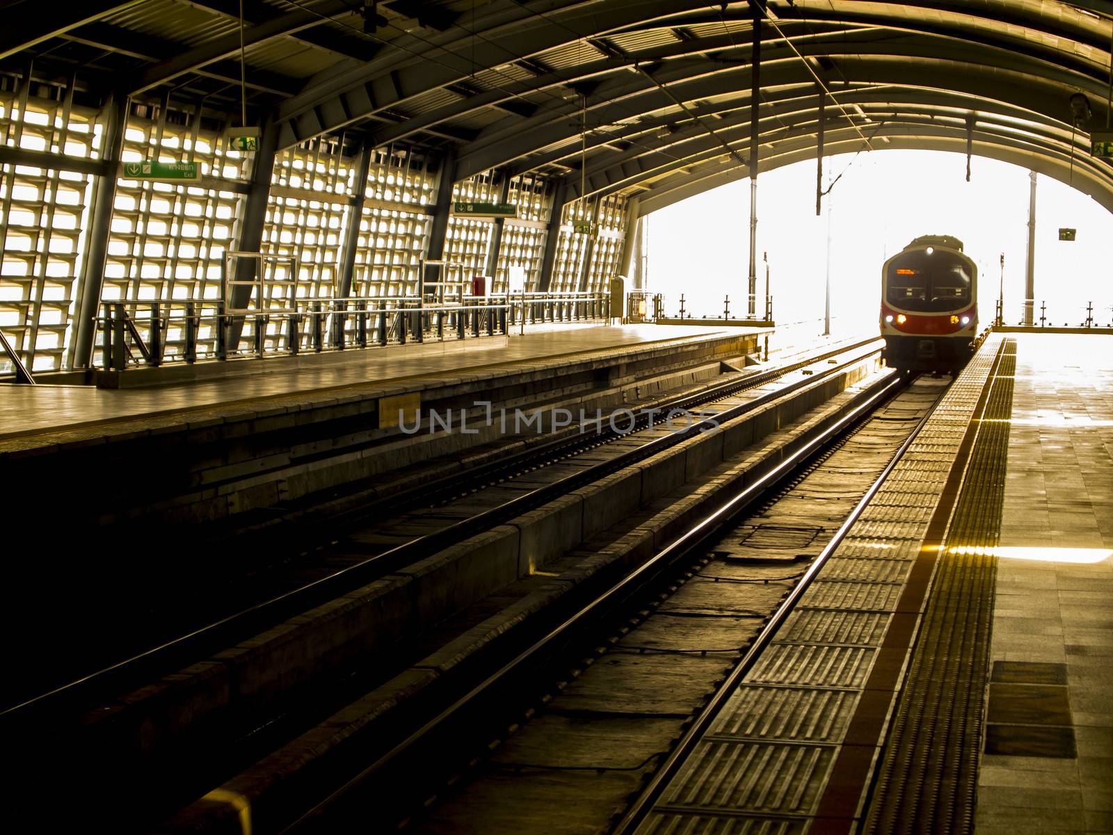 Train come the track at station3 by gjeerawut