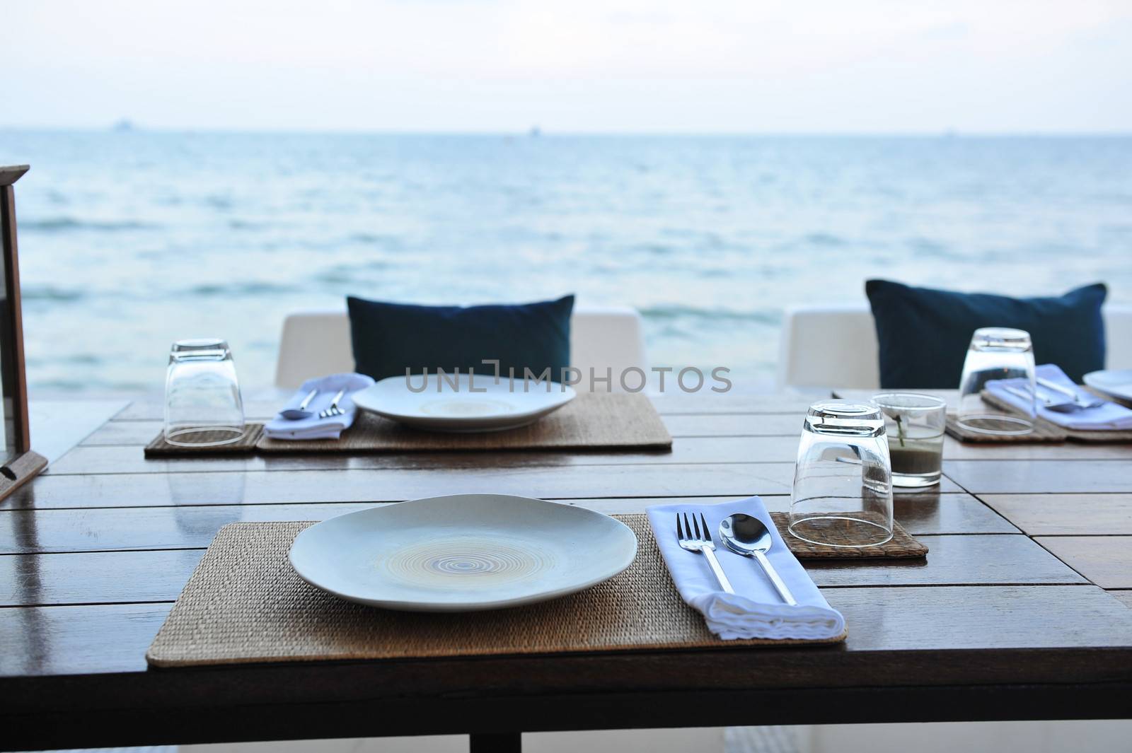 Dining table prepared close to the sea