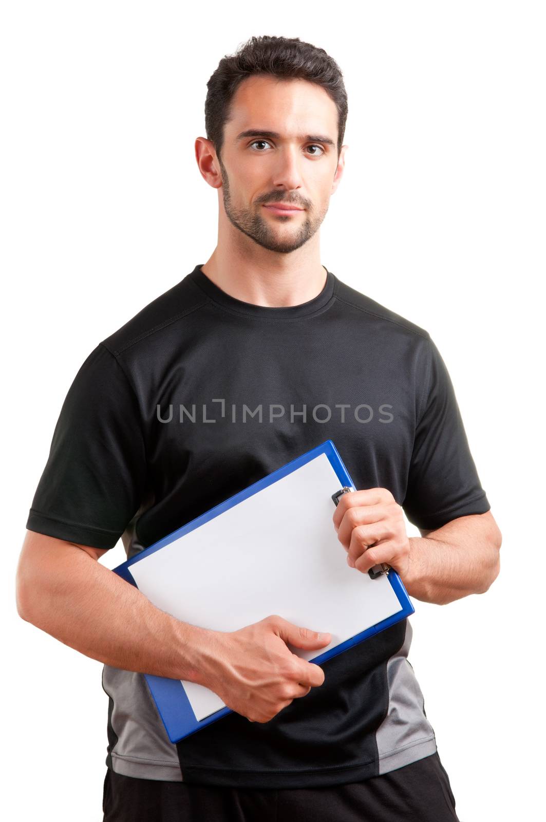 Personal Trainer, with a pad in his hand, isolated in white