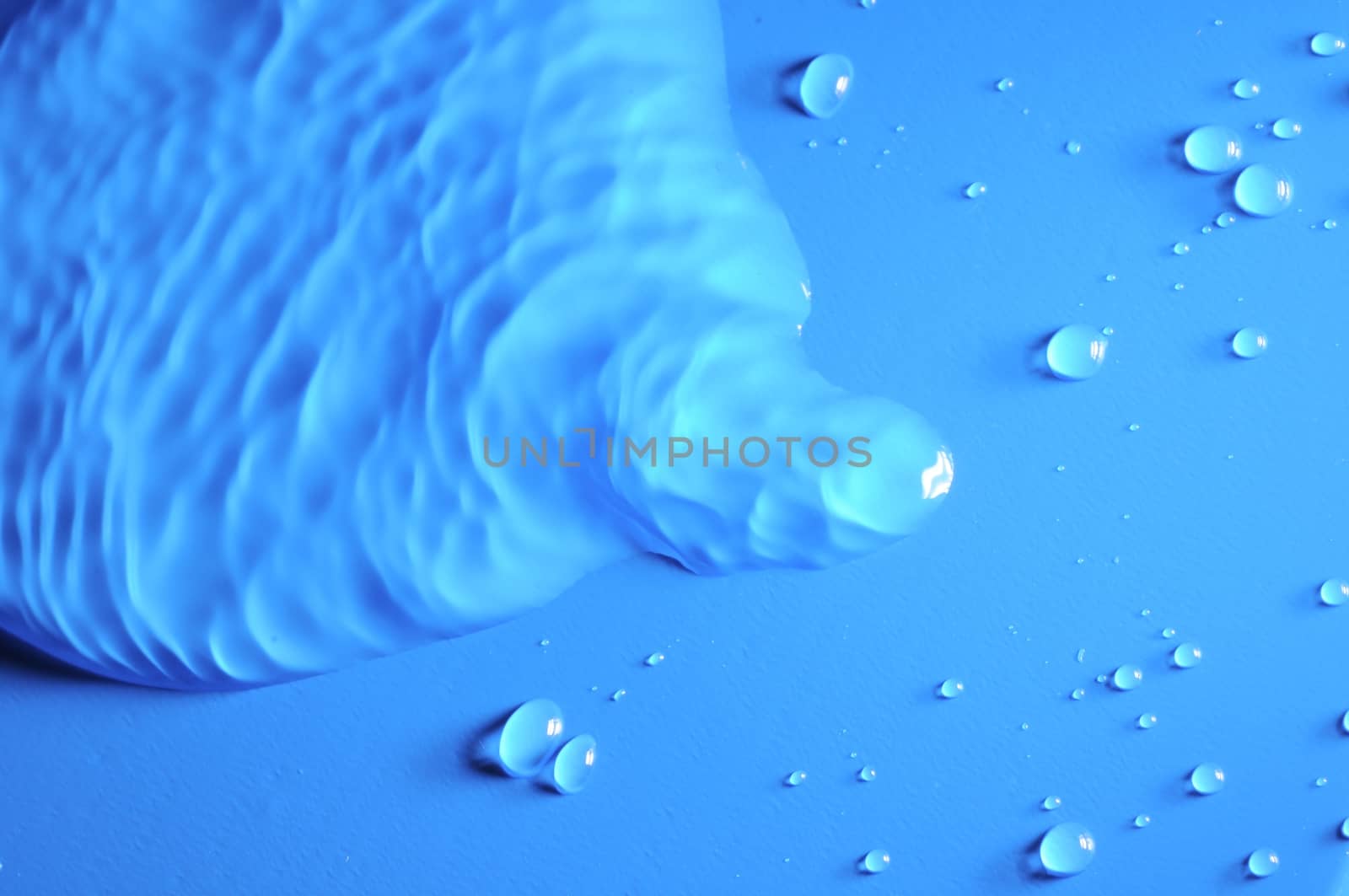 Some Water Drops on a Blue Textured Background
