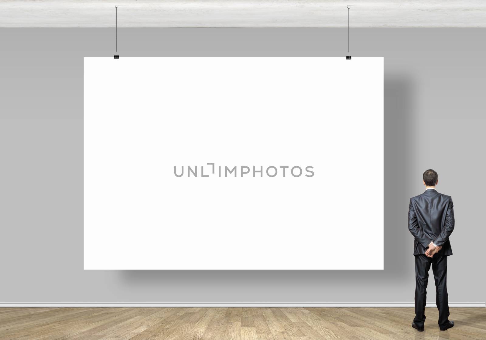 Businessman with banner by sergey_nivens