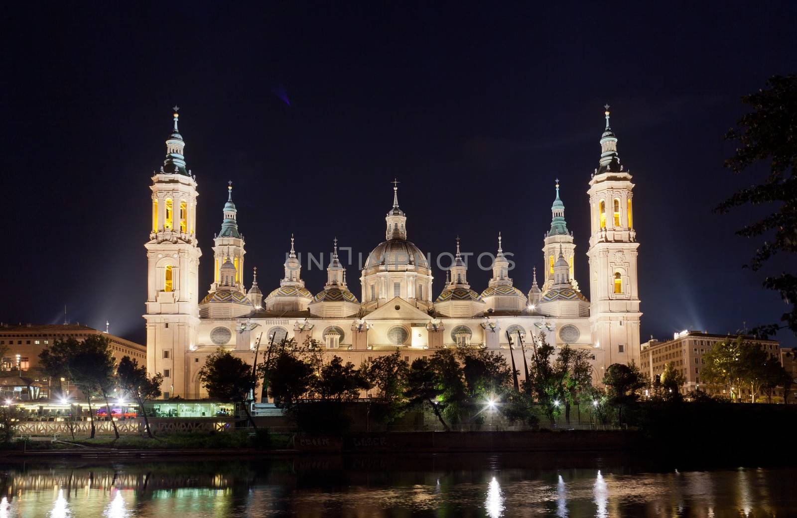 Basilica Del Pilar in Zaragoza in night illumination, Spain by elena_shchipkova