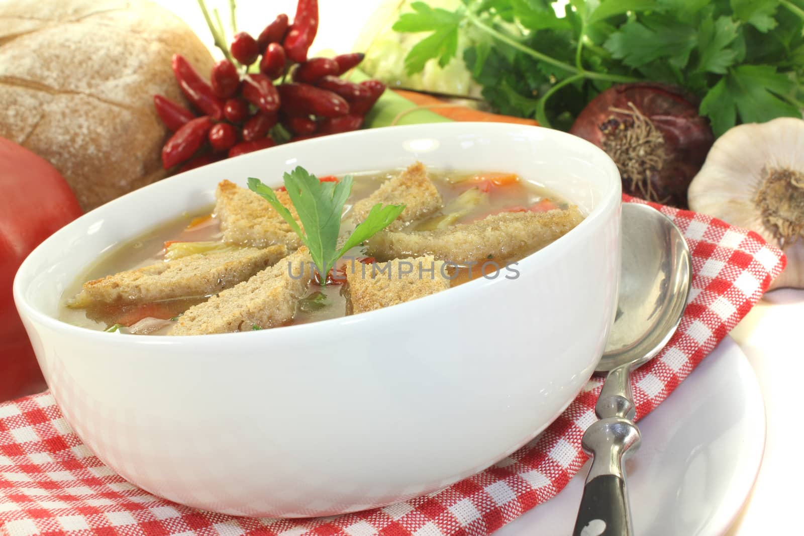 Bread soup with chilli on a light background