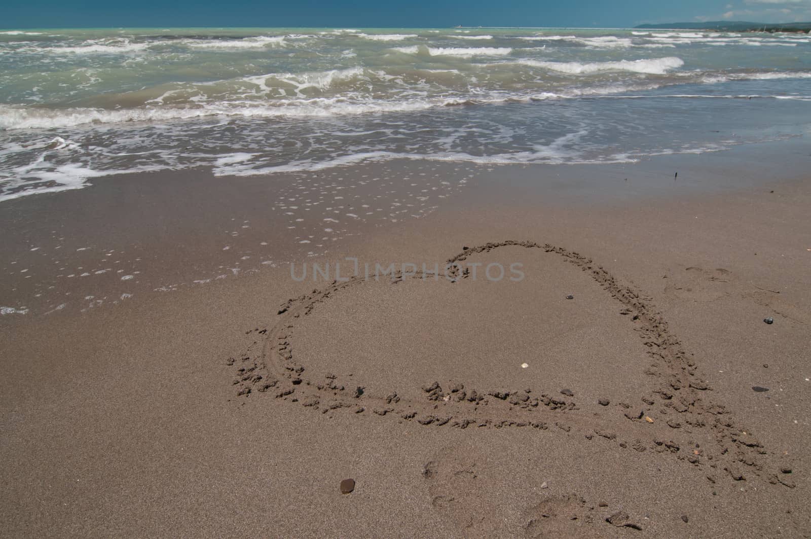 Very big love heart shape on the beach