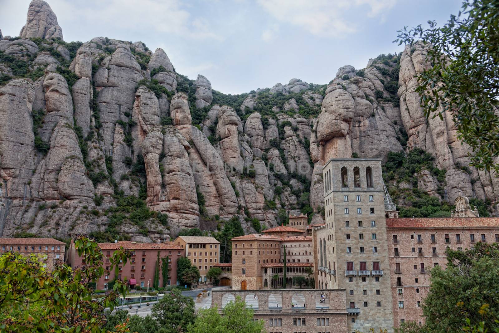 View of Montserrat Monastery. Beautiful Benedictine Abbey, high in mountains. Catalonia. Spain