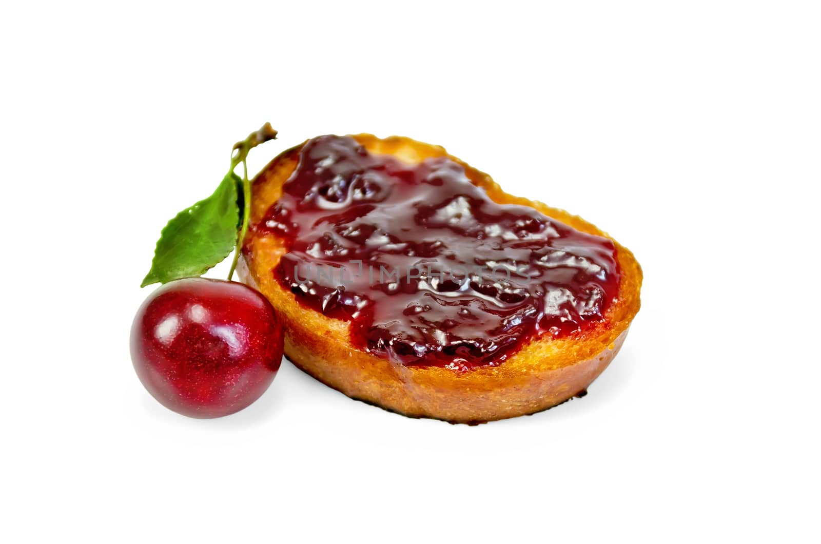 Hunk of toasted bread with cherry jam and cherry isolated on white background