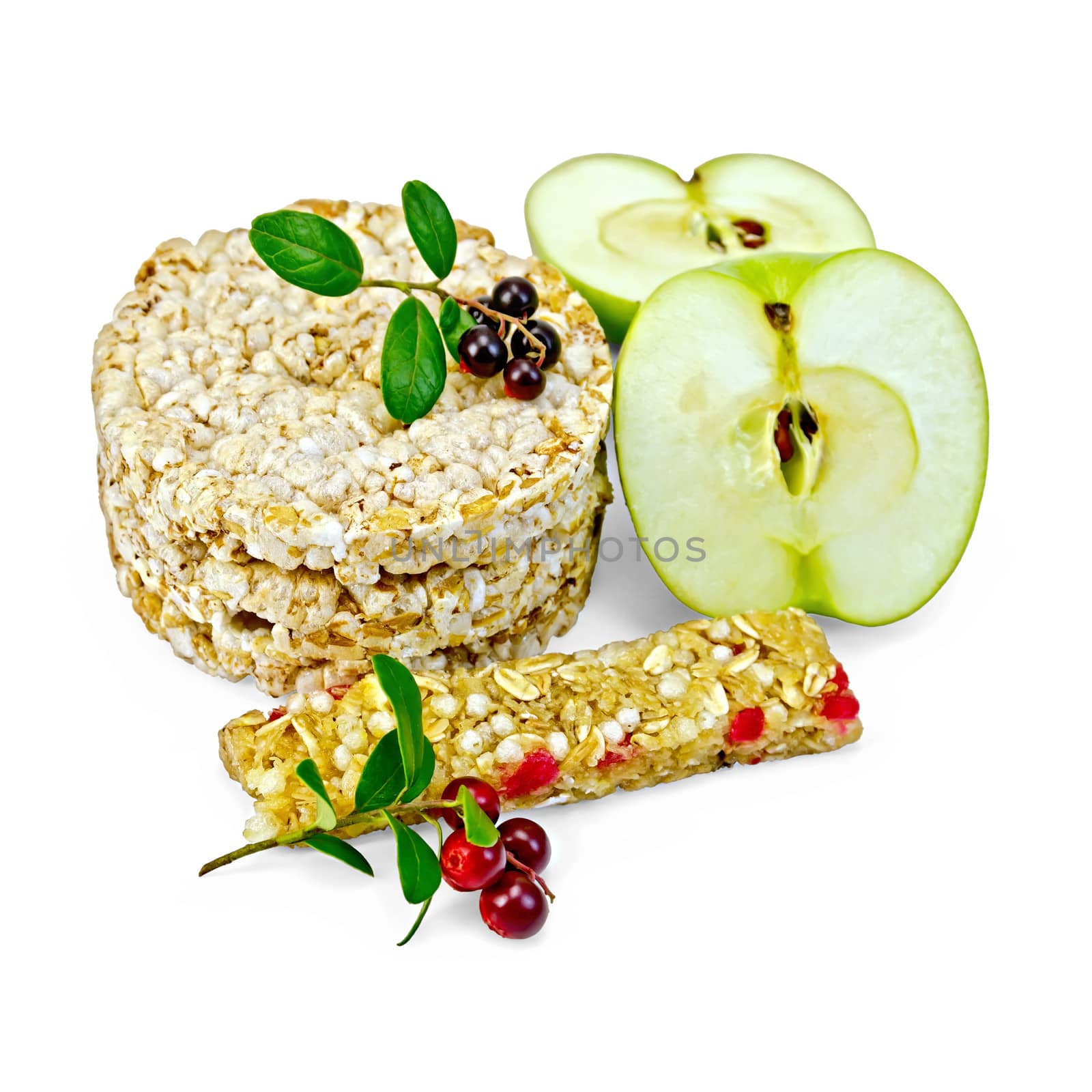 Granola bar, cereals stack crispbreads, sliced green apple, branches with leaves and berries lingonberries isolated on white background