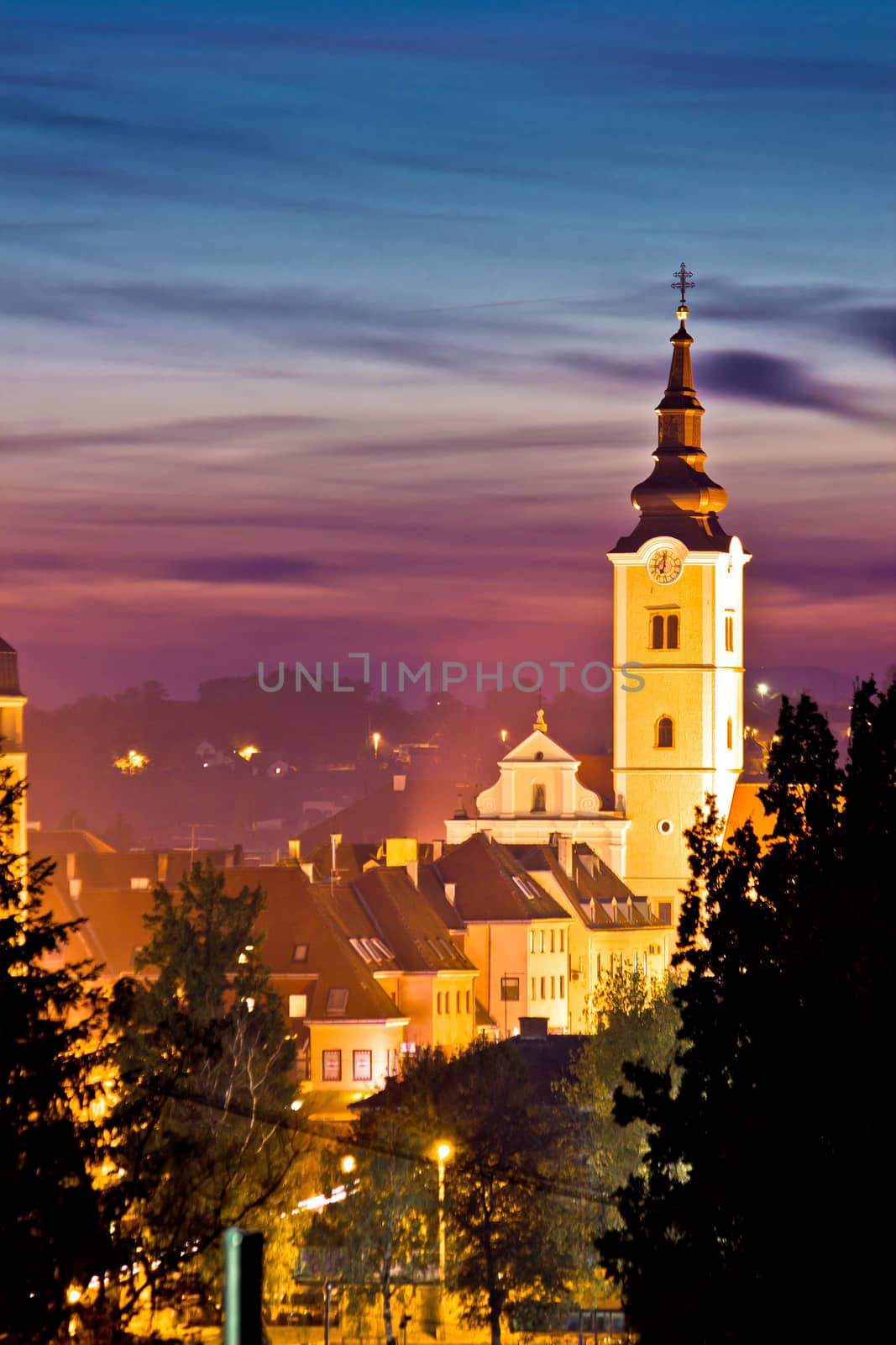Church tower in colorful dusk by xbrchx