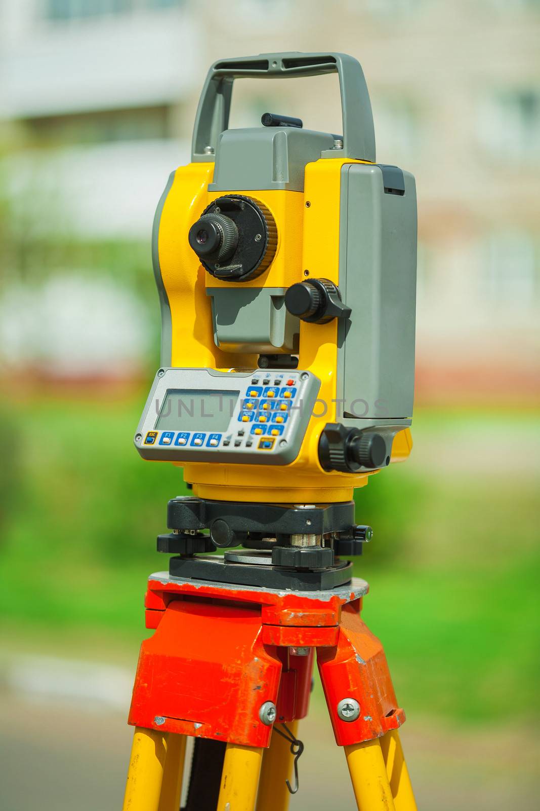 an used electronical theodolite close up by mihalec