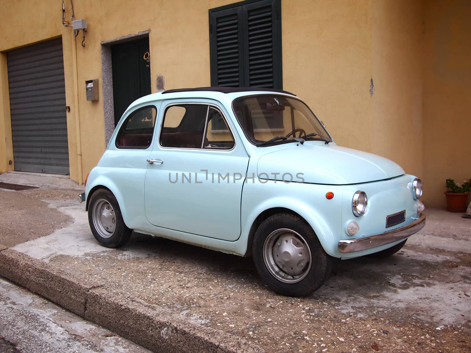 Light blue italian vintage car in Rome.
