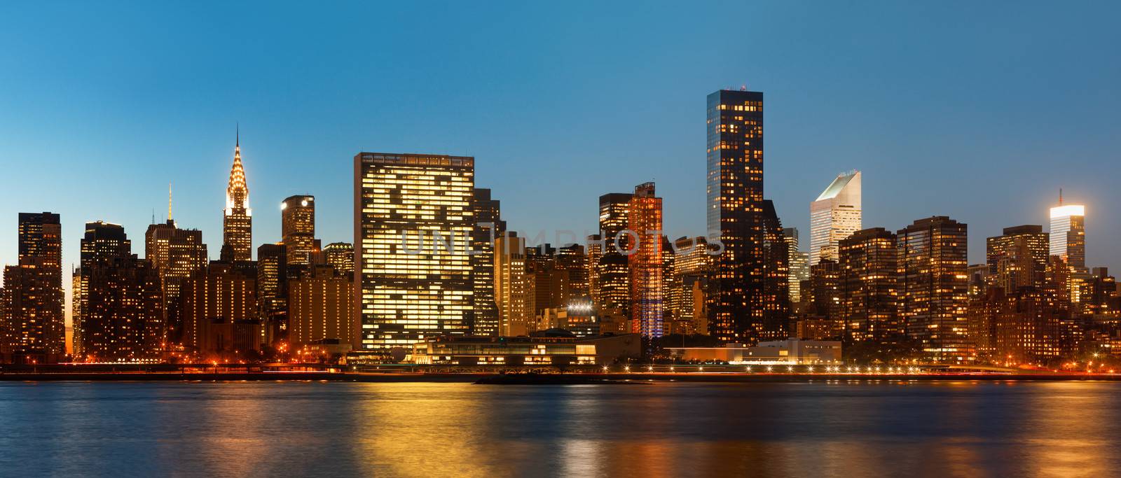 Manhattan. Late evening New York City skyline panorama by palinchak