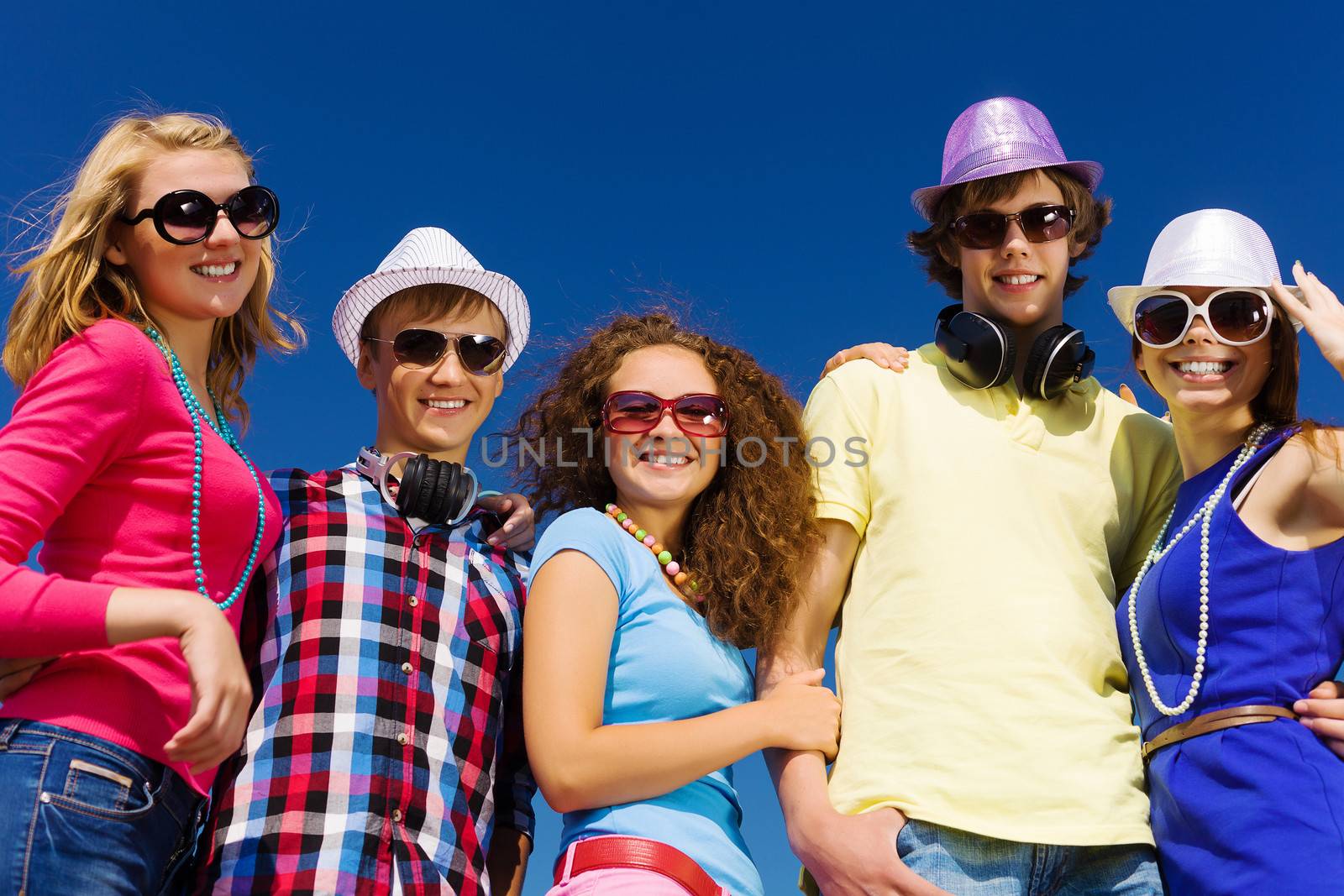 Group of young and happy people having party