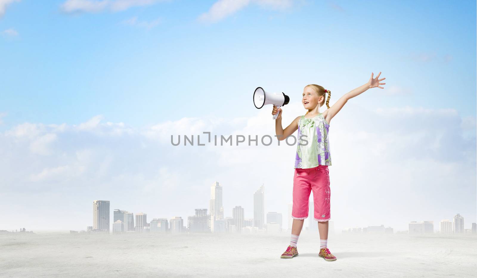 Image of little girl shouting into megaphone