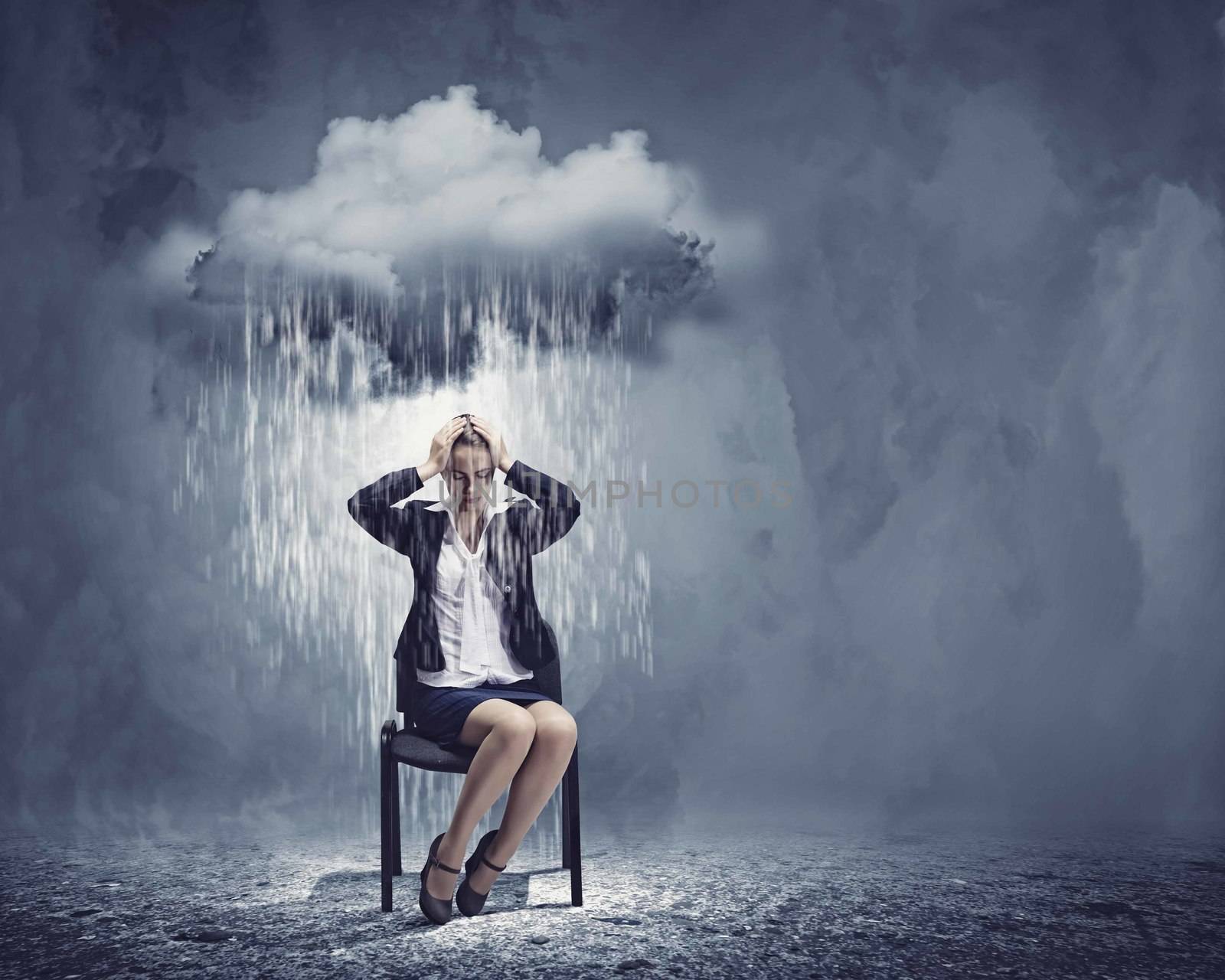 Image of young troubled businesswoman standing under rain