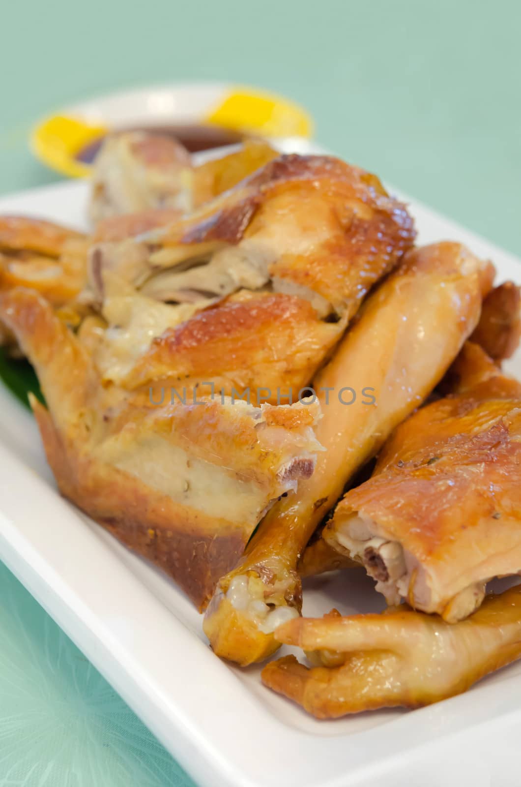 close up grilled chicken on white plate, fast food dish