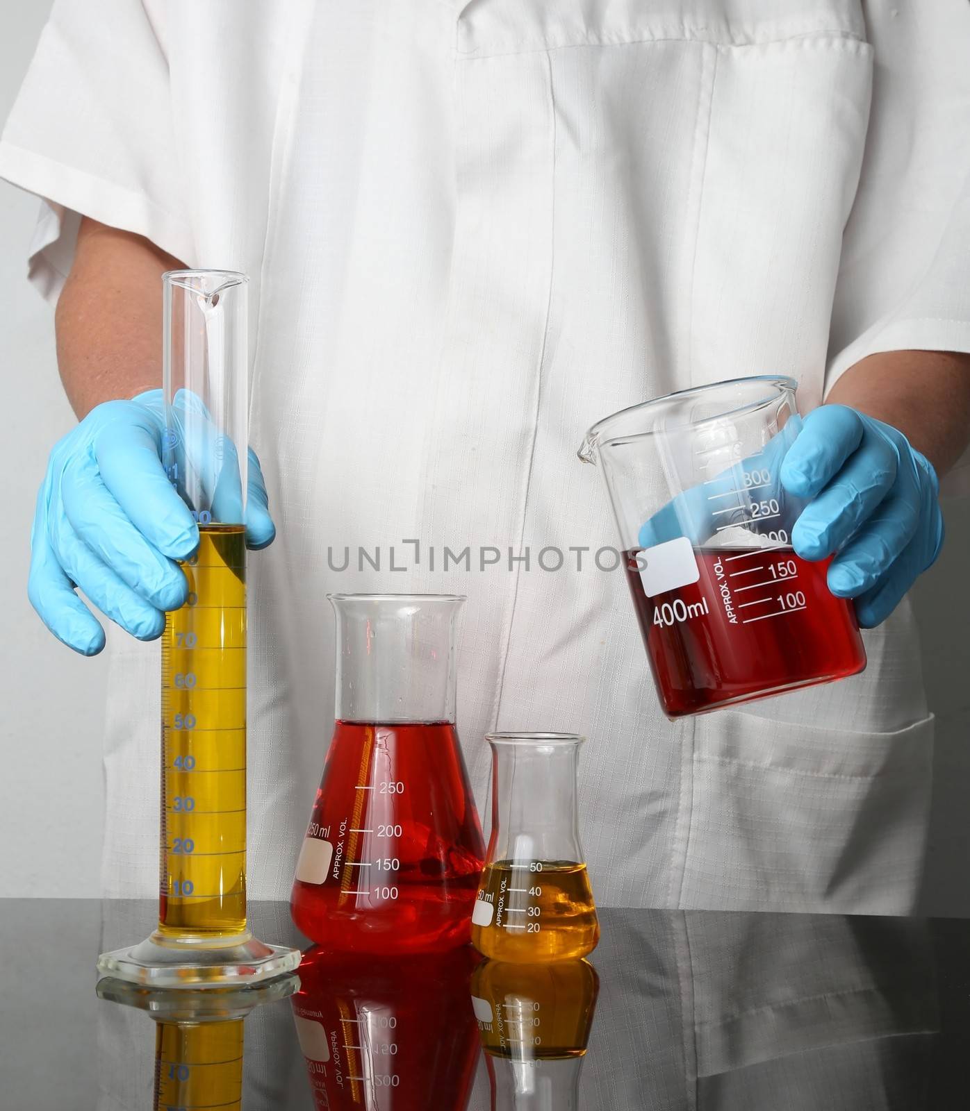 Laboratory Glassware and Hands by fouroaks