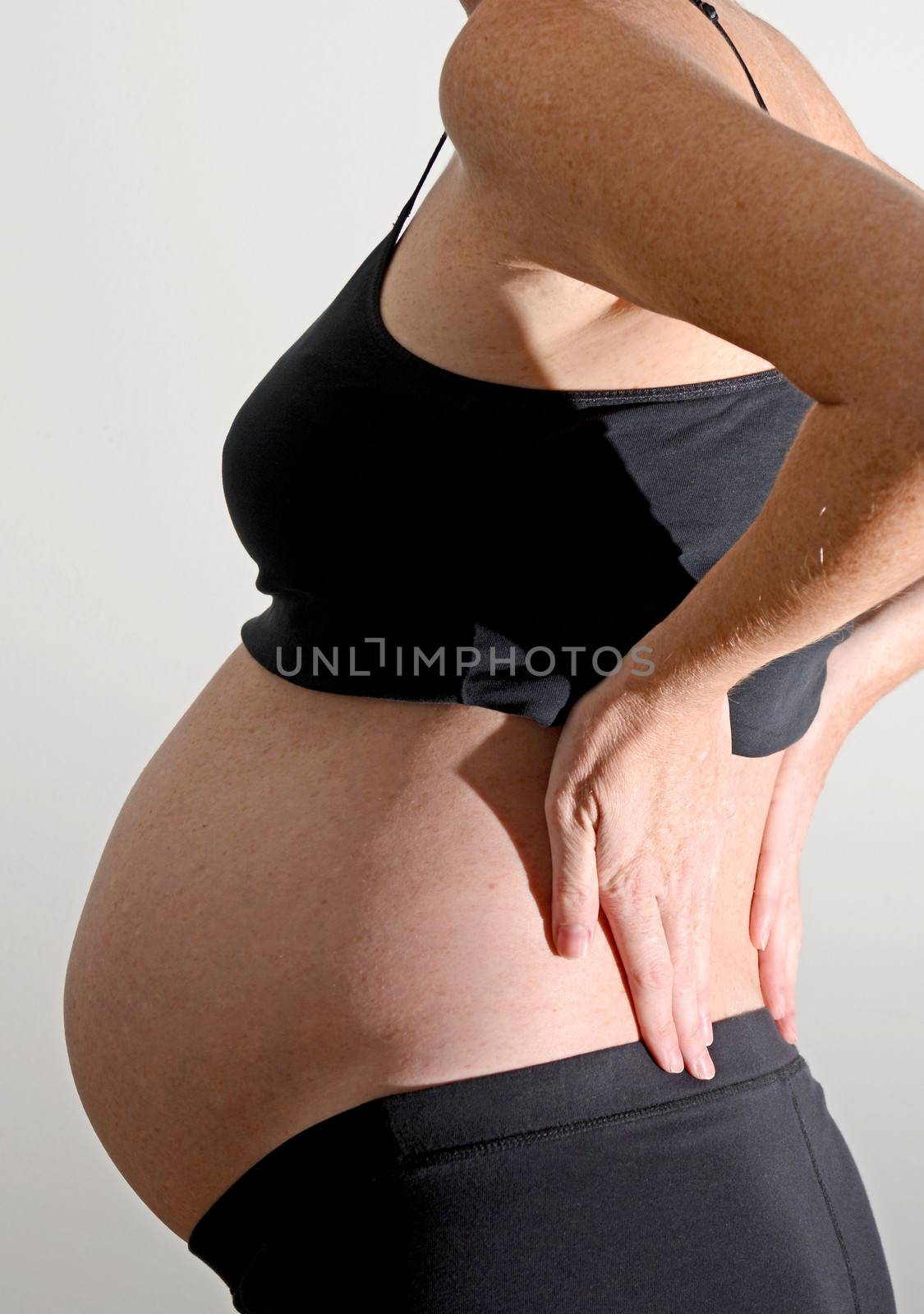 pregnancy back pain by ftlaudgirl