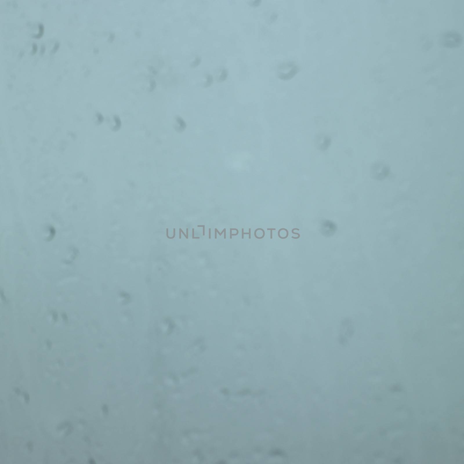 Rain drops in a window by mmm