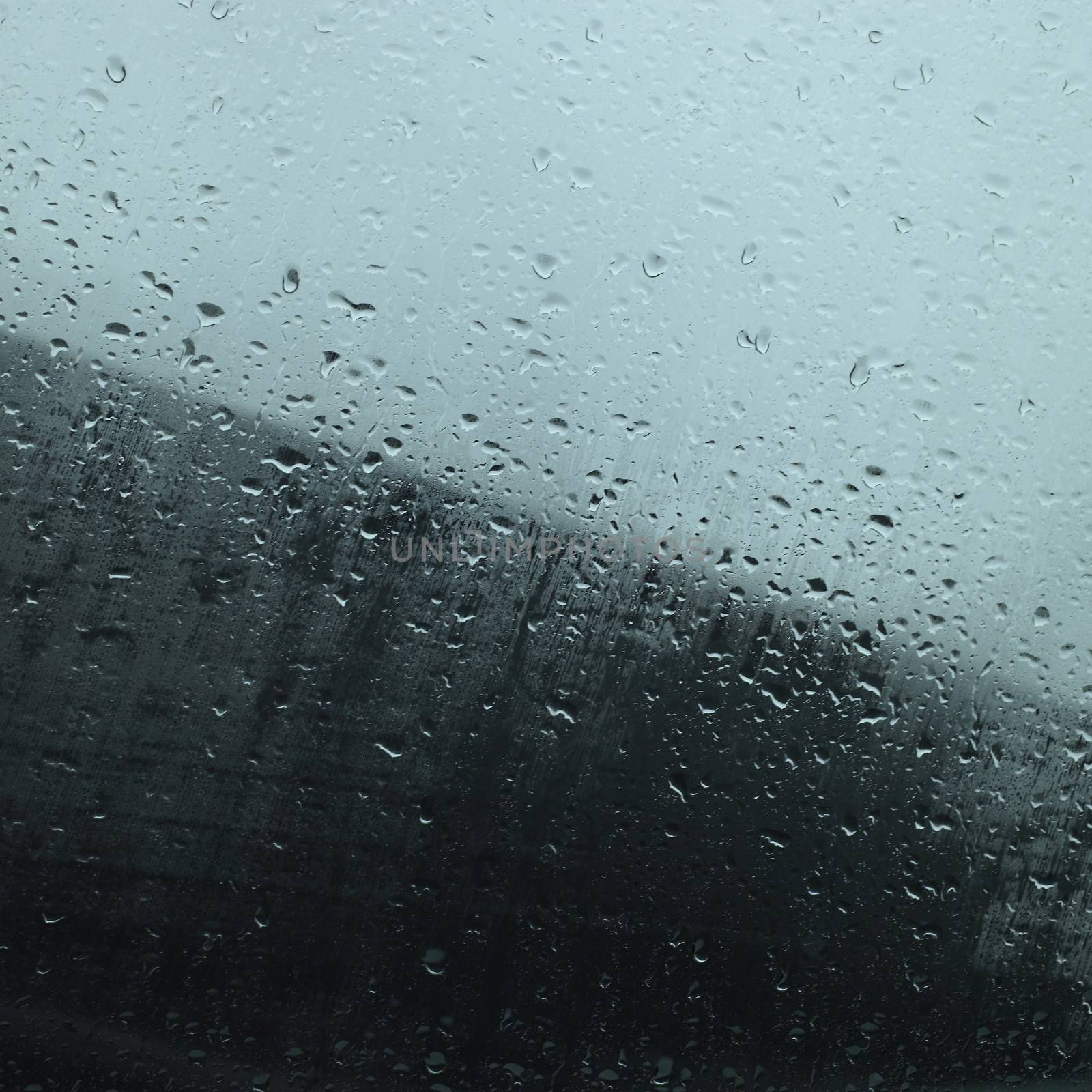 Blurry rain drops in a window