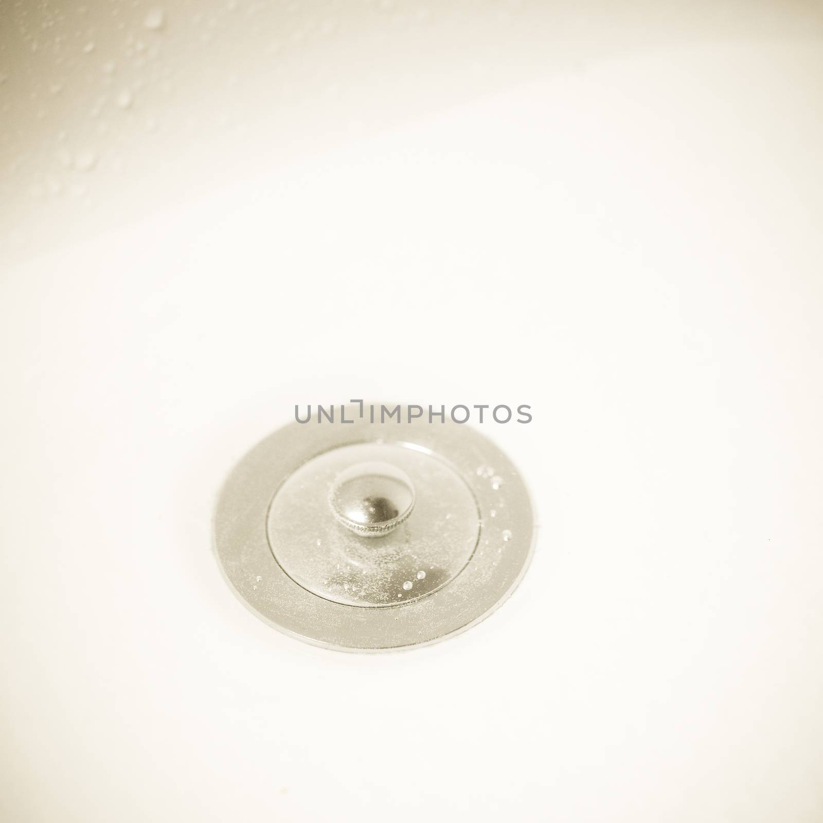 Close up of a silver drain