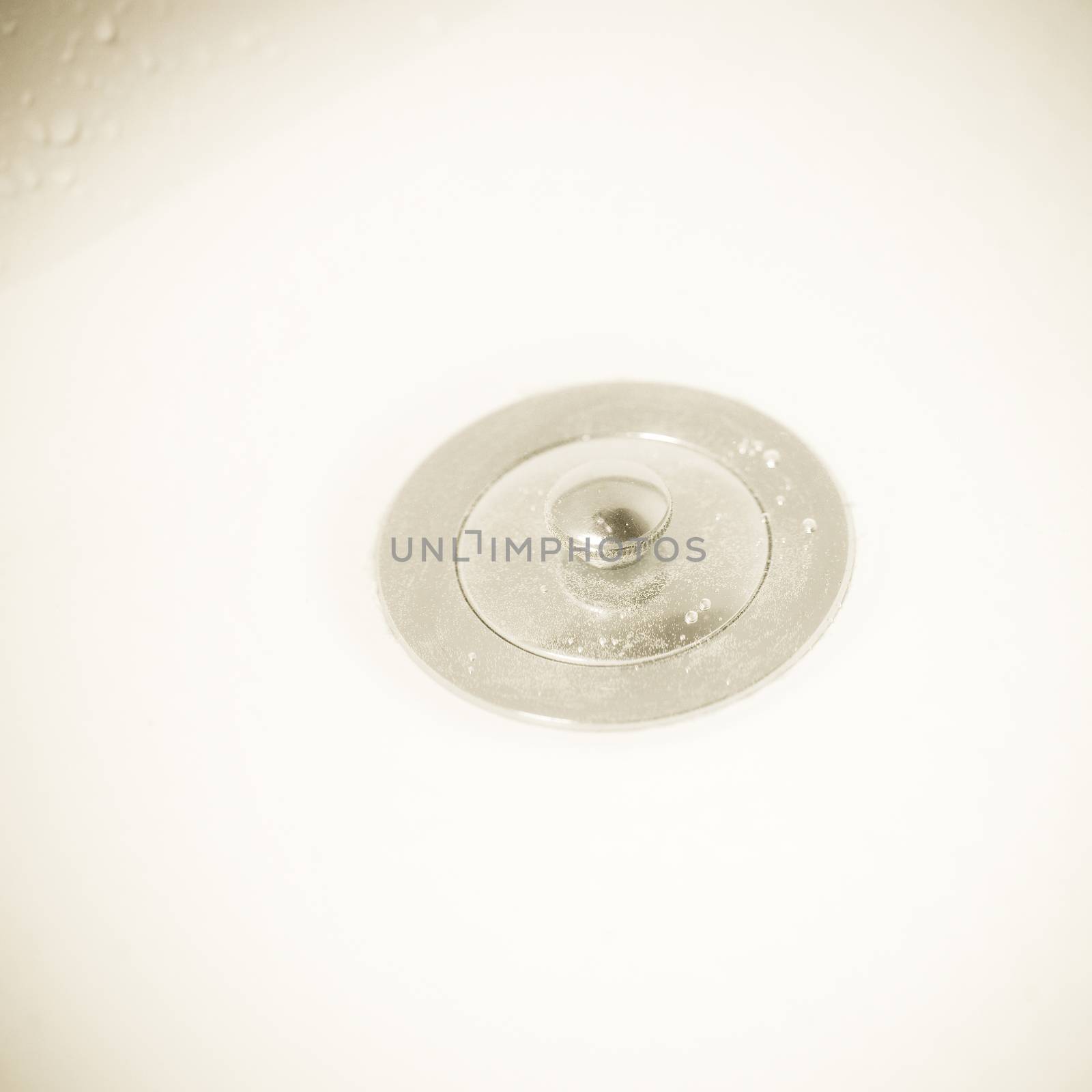 Close up of a silver drain 