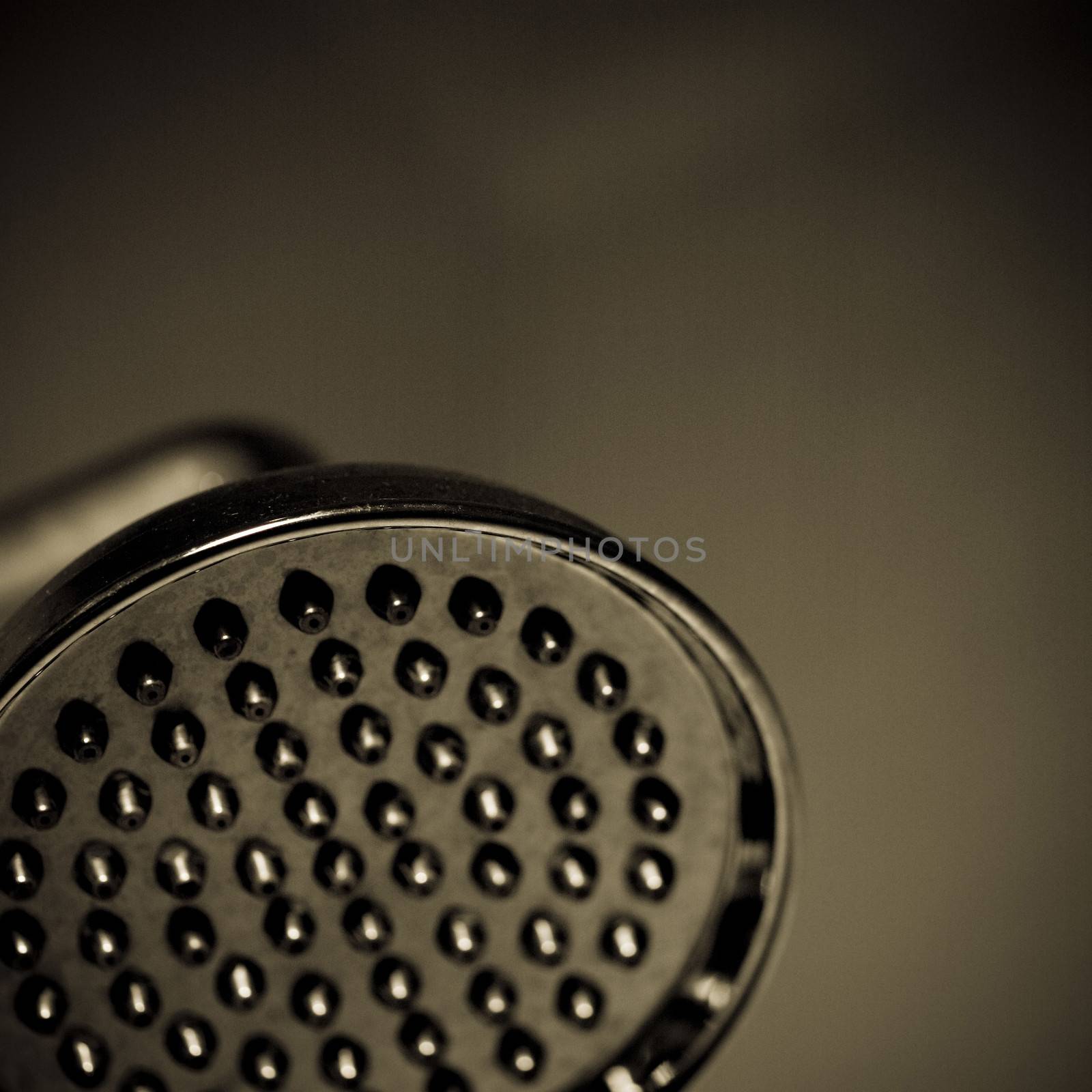 Close up of a silver shower head