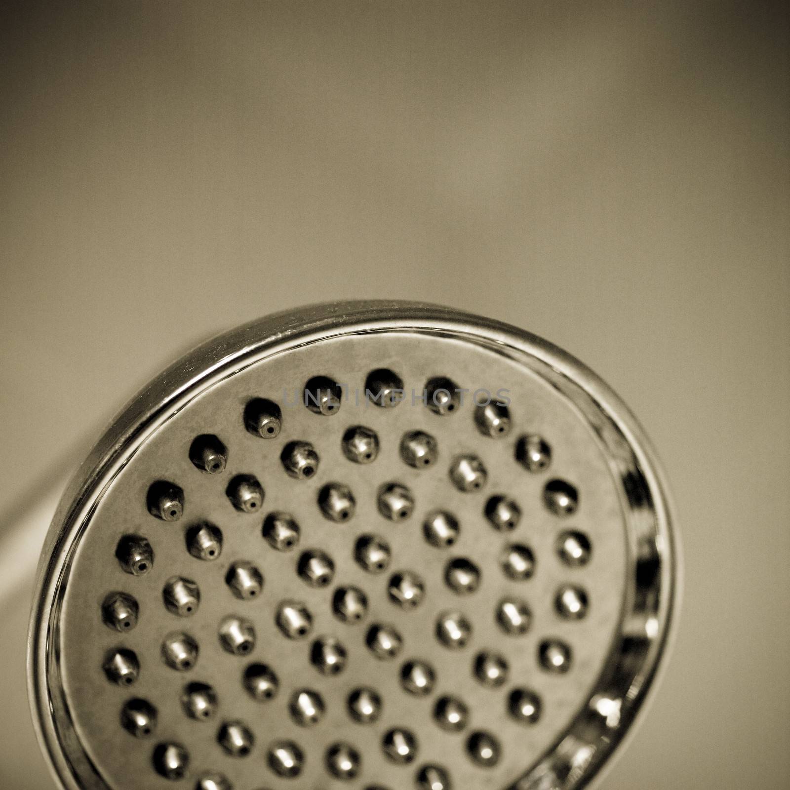 Close up of a silver shower head