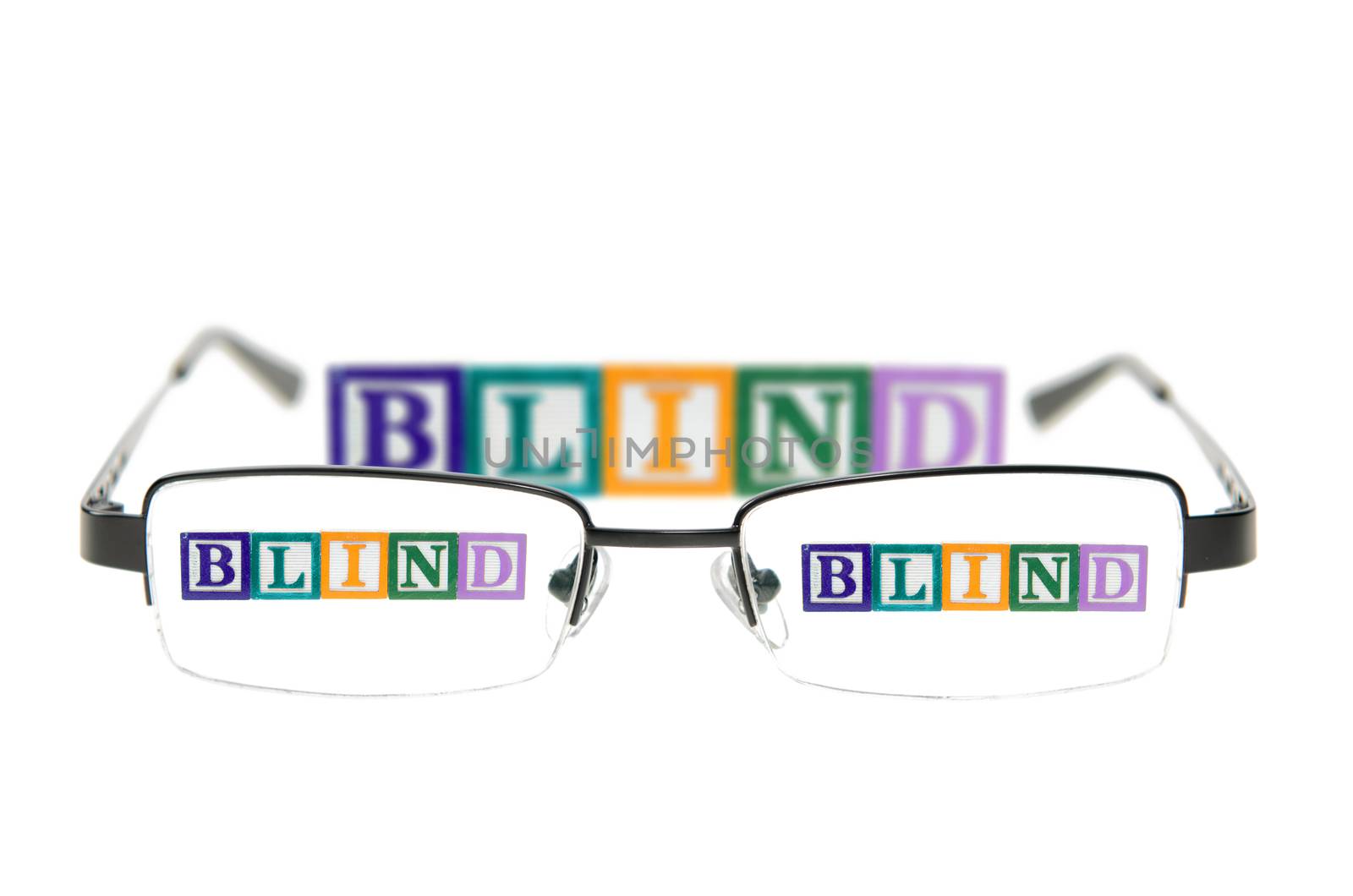 Letter blocks spelling blind through a pair of glasses by dragon_fang