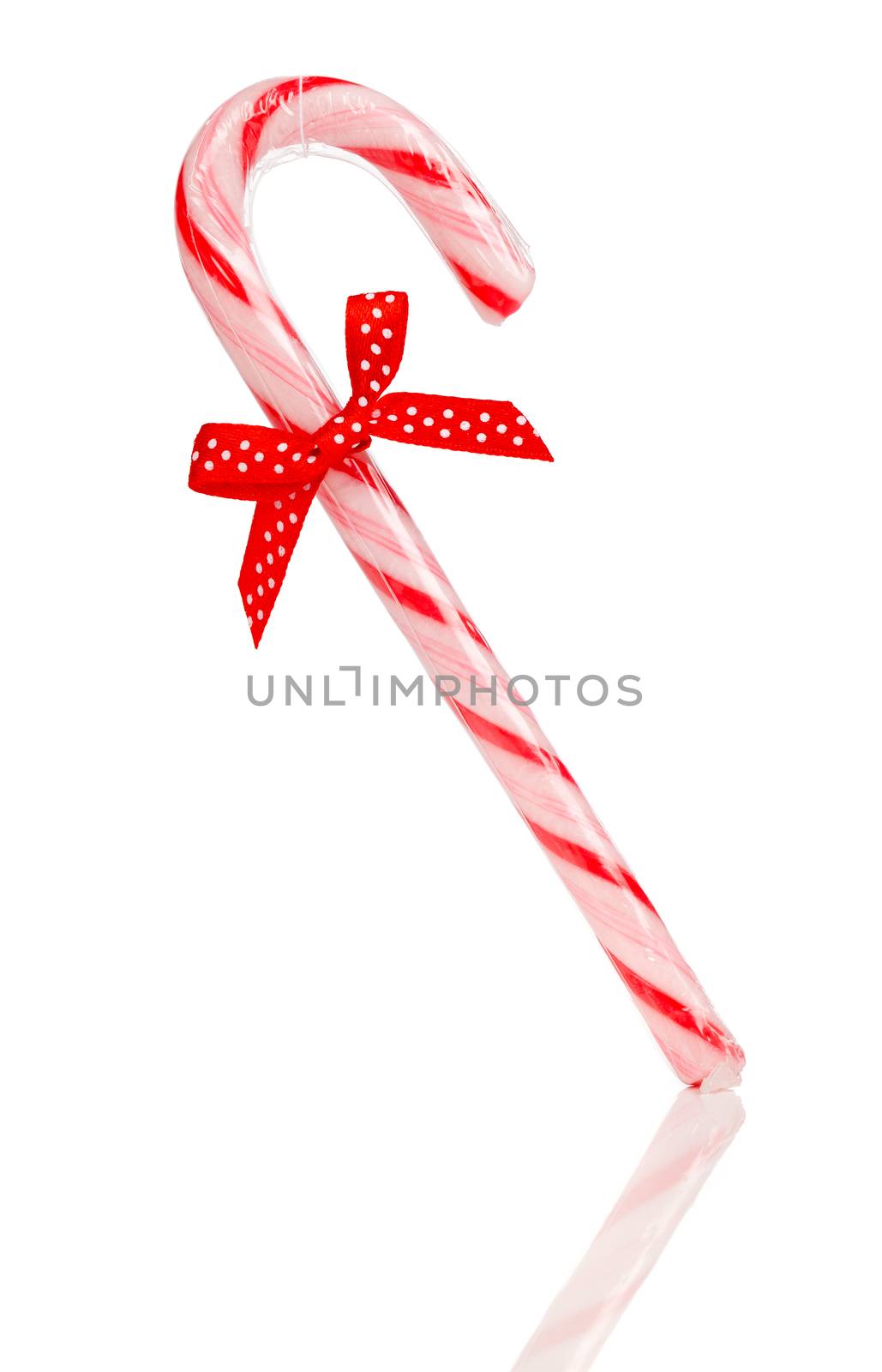 Christmas candy cane isolated on white background  by motorolka