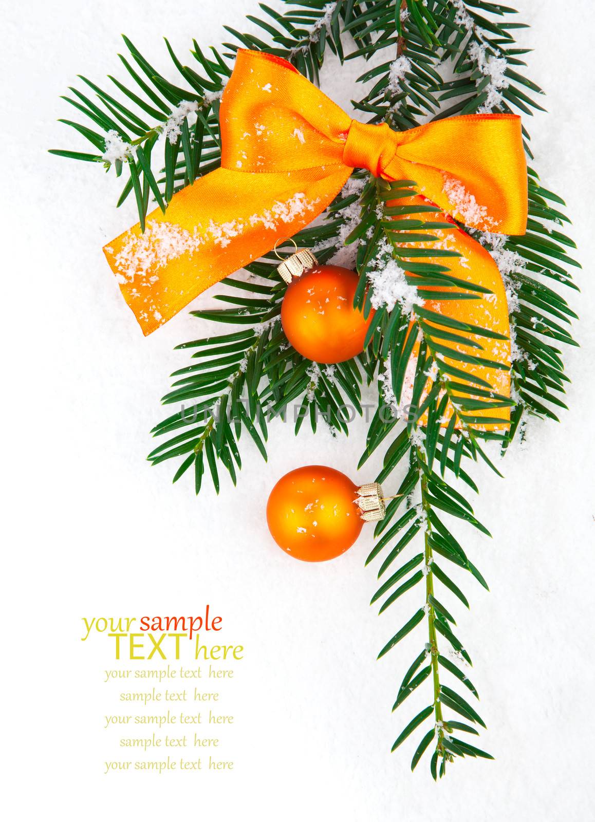 Christmas balls and fir branches with decorations isolated over white