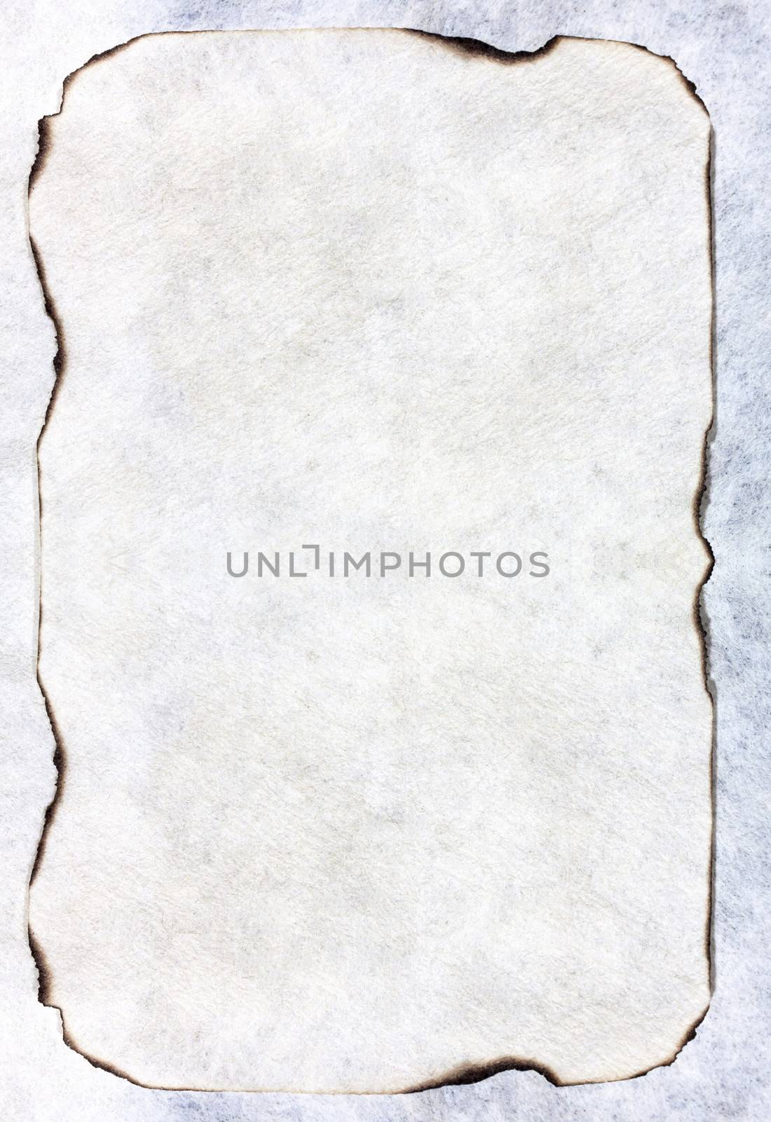 Old paper burning isolated on white background.