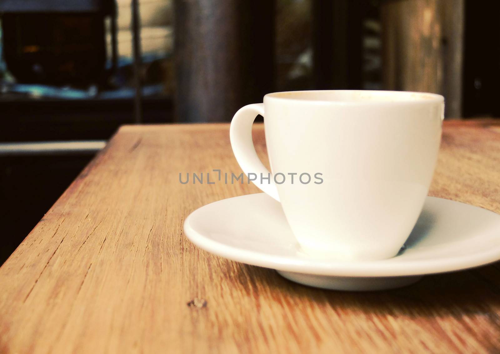 Closeup of cup of coffee on table at coffee shop