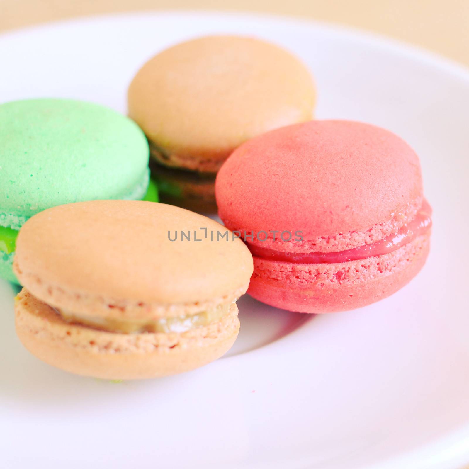 Tasty colorful macaroons with retro filter effect by nuchylee