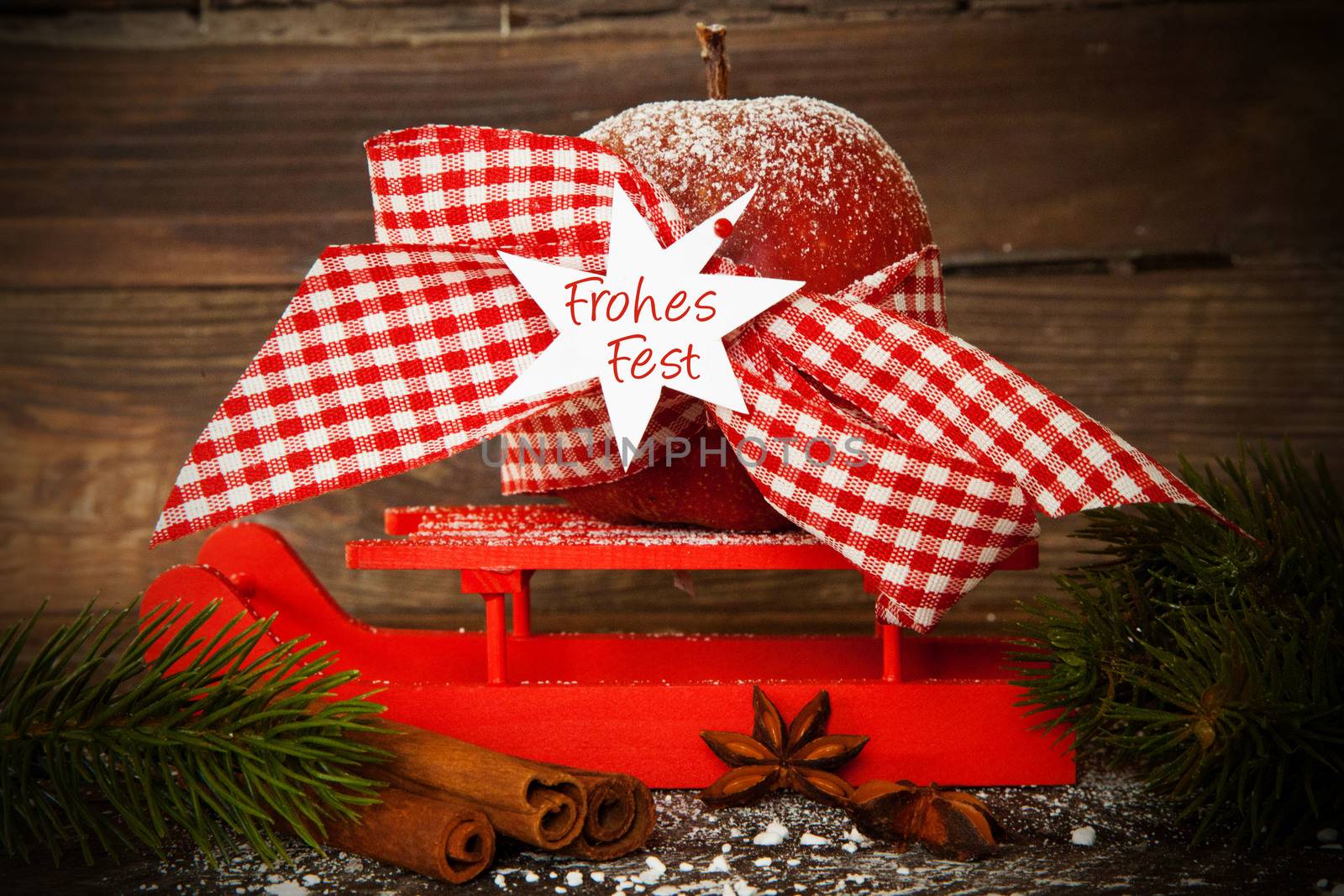 Christmas apple on a red slide