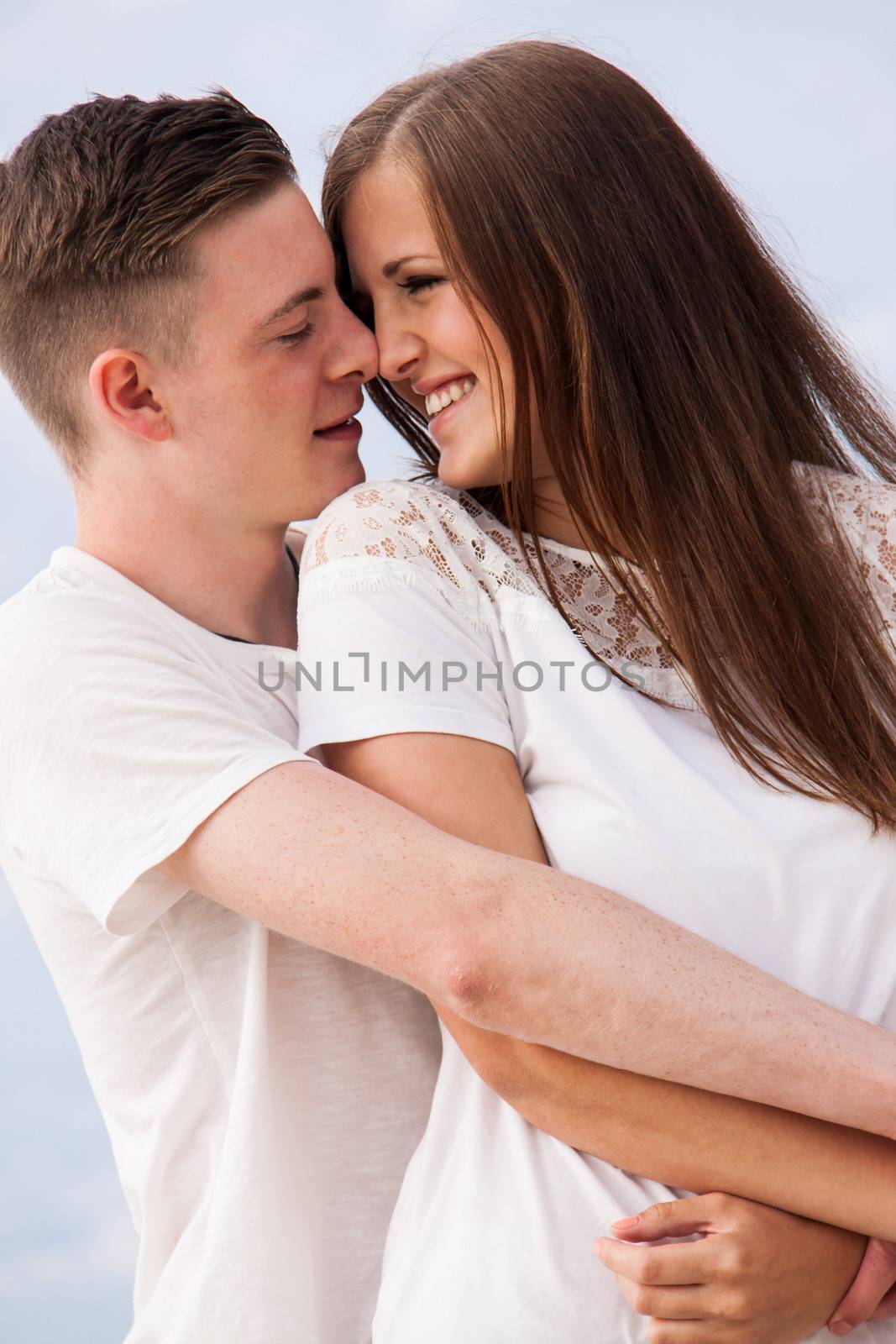 attractive young couple in love having fun in summer holidays vacation