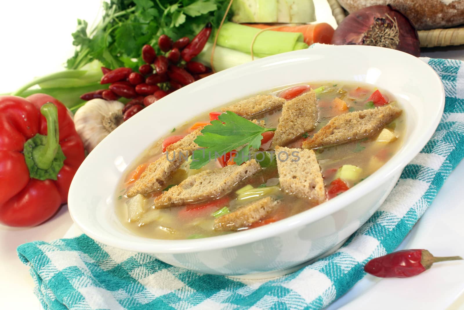 a plate with a colorful bread soup