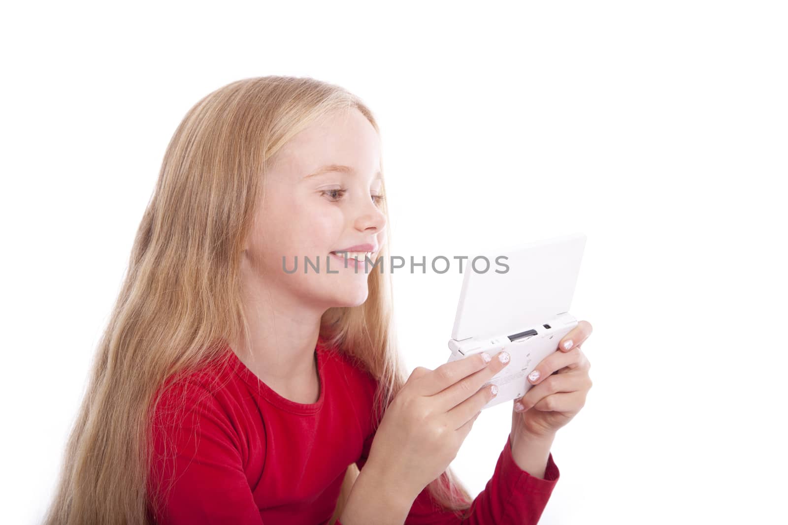 smiling young girl with computer game by ahavelaar