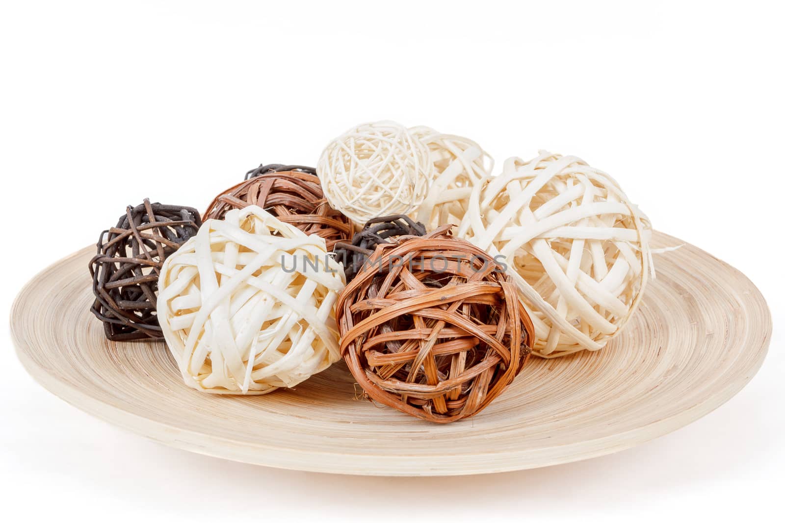 decorative wicker wooden balls on isolated white